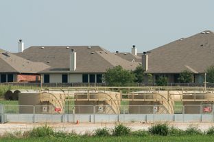 A gas well last fracked in March sits less than 400 feet from a home in Denton, which just became the Texas' first city to ban fracking.