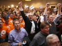 Republican supporters including John Eads (C) of Colorado Springs, Colorado, cheer as a television broadcast declares the Republicans had taken control of the Seante at the Colorado Republican party's election night event at the Denver Tech Center Hyatt on November 4, 2014. Republicans picked up at least seven seats in the Senate in the mid-term elections. (Photo by Marc Piscotty/Getty Images)
