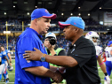 DETROIT, MI - OCTOBER 05: head coach Jim Caldwell of the Detroit Lions congratulates head coach Doug Marrone of the Buffalo Bills on their win at Ford Field on October 05, 2014 in Detroit, Michigan. The Buffalo Bills win 17-14. (Photo by Joe Sargent/Getty Images)