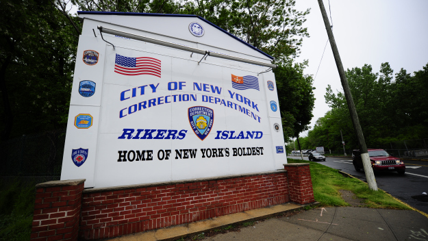 FILE - A view of the entrance to Rikers Island penitentiary complex. (Photo credit EMMANUEL DUNAND/AFP/Getty Images)