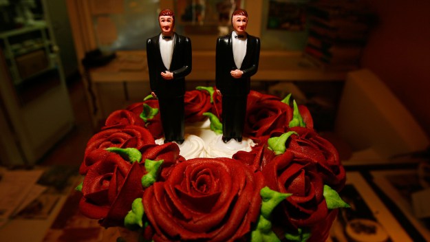 Despite a judge's ruling that a gay marriage ban is unconstitutional, many counties are refusing to issue marriage licenses to same-sex couples.(Photo by David McNew/Getty Images)