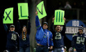 SEATTLE, WA - JANUARY 19: Seattle Seahawks fans hold up a sign for Super Bowl XLVIII in the fourth quarter while taking on the San Francisco 49ers during the 2014 NFC Championship at CenturyLink Field on January 19, 2014 in Seattle, Washington.