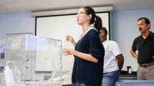 Students taking part in Columbia University's Ebola design challenge demonstrated for judges how to use a special chamber for decontaminating small items.