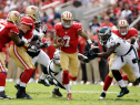 SANTA CLARA, CA - SEPTEMBER 28:  Colin Kaepernick #7 of the San Francisco 49ers runs with the ball against the Philadelphia Eagles at Levi's Stadium on September 28, 2014 in Santa Clara, California.  (Photo by Ezra Shaw/Getty Images)