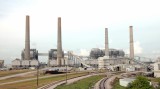 NRG Energy's W.A. Parish power plant in Fort Bend County will begin capturing some of its carbon emissions in 2016. (NRG Energy photo)
