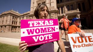 A day after a federal appeals court allowed Texas to begin enforcing new abortion restrictions, a group protested the ruling on the South Steps of the Texas Capitol building.