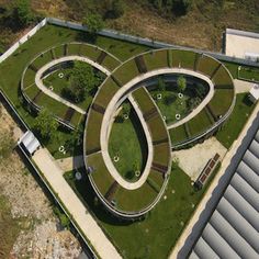 Sustainable farm built on spiraling roof of Vietnamese kindergarten