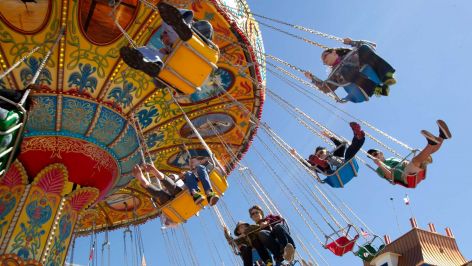 Riders take a spin on the Gulf Glider on the Pleasure Pier Monday, March 11, 2013, in Galveston. ( Brett Coomer / Houston Chronicle )