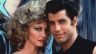 Grease:  As much as we love the music, the cool '50s cars and John Travolta and Olivia Newton John as Danny and Sandy, the basic love story for the musical is as follows: Good girl meets bad boy; bad boy treats good girl poorly in front of friends then wins her back; couple continues to have conflicts over good girl vs. bad boy lifestyle choices until the good girl picks up some bad habits and dresses considerably more trampy. This is a terrible message for couples: leather pants will not solve all your relationship problems (just some of them).