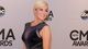 Kellie Pickler  showed off her curves in a slinky sparkly