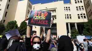 Iranians protest in Isfahan, Iran, last month in solidarity with women injured in a series of acid attacks. Several women have been attacked by assailants on motorcycles who threw acid on their faces, purportedly because they were "badly veiled."