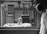 Window-hanging baby cage, 1937.  This just seems like a really bad idea, there really have to be better ways to get vitamin k.