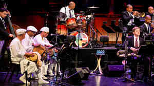 Percussionists Clemente Medina, Román Diaz and Pedrito Martinez perform with the Jazz at Lincoln Center Orchestra.