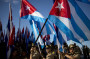 Students march carrying Cuban flags during a march against terrorism in Havana, Cuba, Tuesday, Sept. 30, 2014. Youths marched today through downtown Havana in protest against the United States policy towards the island nation and demanding the that U.S. free three Cuban agents imprisoned there. (AP)