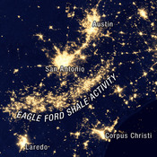 This nighttime NASA satellite image from 2012 shows lights from drilling sites and natural gas flaring along the Eagle Ford Shale.