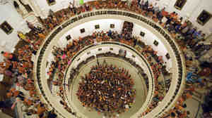 Abortion-rights advocates filled the rotunda of the state capitol in July 2013 as Texas senators debated sweeping abortion restrictions. Some of those restrictions are now under federal review.