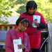 Marthella Johnson, left, and Gloria Smith canvass a neighborhood in Little Rock, Ark., urging voters to support a minimum-wage initiative.