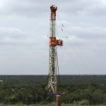 A rig contracted by Apache Corp drills a horizontal well in a search for oil and natural gas in the Wolfcamp shale located in the Permian Basin in West Texas.