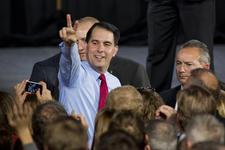 Wisconsin Gov. Scott Walker greets supporters at his election night party Nov. 4, 2014 in West Allis, Wisc.