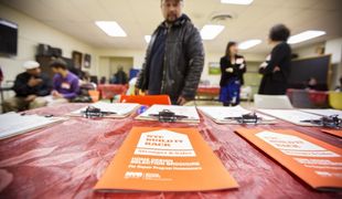 Cities and states hire private companies to help handle the workload after disasters, but homeowners still face long delays and other problems. Above, a table full of flyers at a community meeting for