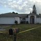 A body was found Nov. 5, 2014, inside this Cape Coral, Fla., home when the owner who purchased it at auction went to clean.