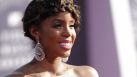 Kelly Rowland, who is expecting a baby boy, looks beautiful in a shiny silver gown.
