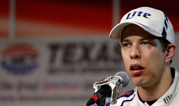 Brad Keselowski, driver of the #2 Miller Lite Ford, speaks to the media after being involved in a fight with Jeff Gordon, driver of the #24 Drive To End Hunger Chevrolet, at the conclusion of the NASCAR Sprint Cup Series AAA Texas 500 at Texas Motor Speedway on November 2, 2014 in Fort Worth, Texas.  (Photo by Sean Gardner/Getty Images for Texas Motor Speedway)
