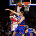 Detroit’s Josh Smith, left, driving on Cole Aldrich. The Knicks, struggling on offense, allowed the Pistons to earn their first win.