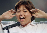 On July 25, 1990, Barr performed “The Star-Spangled Banner” before a baseball game between the San Diego Padres and Cincinnati Reds. What will go down in history as probably the worst rendition ever, Barr offended many including President George H.W. Bush, who called her rendition “disgraceful.” (Photo: AP) Click Here for Video