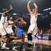 Mason Plumlee (1) trying to slow the Thunder’s Reggie Jackson on Monday night. With a 116-85 win, the Nets improved to 2-1.