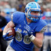 Air Force’s Garrett Griffin evaded Army’s Rhyan England on a scoring play Saturday. Army had been stung the previous week by a report on recruiting violations.