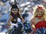 Tennessee Titans cheerleaders, dressed in Halloween costumes, perform in the fourth quarter of an NFL football game against the Houston Texans Sunday, Oct. 26, 2014, in Nashville, Tenn. (AP Photo/Mark Zaleski)