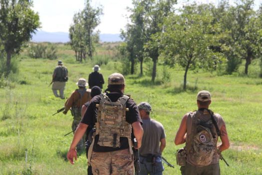 Photos showing dozens of members of the militia groups on the U.S.-Mexico border carrying semi-automatic rifles and wearing masks, camouflage and tactical gear provide one of the first glimpses into the group's activities on the border. Photo: Provided To The San Antonio Express-News