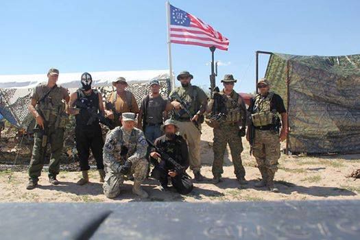 Photos showing dozens of members of the militia groups on the U.S.-Mexico border carrying semi-automatic rifles and wearing masks, camouflage and tactical gear provide one of the first glimpses into the group's activities on the border. Photo: Provided To The San Antonio Express-News