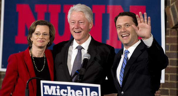 Former President Bill Clinton stands with Democratic candidate for Georgia Governor Jason Carter, and Democratic candidate for U.S. Senate Michelle Nunn. | AP Photo 
