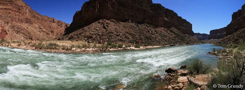 Panoramic image of the Colorado River flowing through Badger Creek rapid.