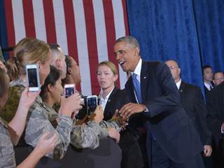 Say Cheese: Obama Smiles for Cameras at CENTCOM