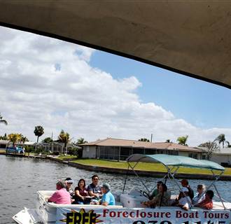 Image: Boat Tours Give Buyers Close-Up View Of Foreclosed Homes