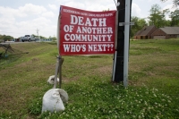 A sign on a Bayou Corne resident's lawn near the sinkhole