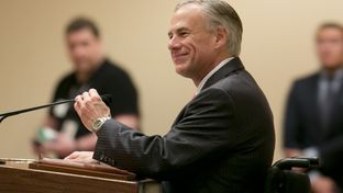 Attorney General Greg Abbott, the Republican nominee for governor, speaks at a GOP women's luncheon on Oct. 8, 2014.