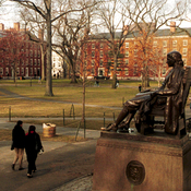 People walk through the University's iconic Harvard Yard. This week, a faculty study that secretly photographed students to monitor their attendance in lectures has come under fire.