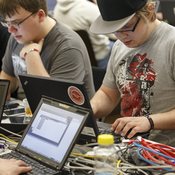 Participants in an ethical hacking contest at a Swiss security conference in Geneva in March. So-called bug bounty programs are becoming very popular in Silicon Valley's high-tech sector.