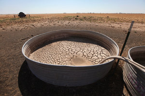 Cracked mud sits in the bottom of a water tank in a cow pasture near Tulia, Texas. In recent months, the state has experienced its driest weather since records were first kept, in 1895.
