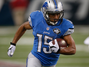 Golden Tate of the Detroit Lions scores in the fourth quarter against the New Orleans Saints at Ford Field on Oct. 19 in Detroit.