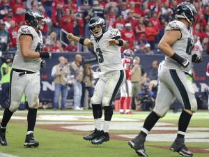 Philadelphia Eagles quarterback Mark Sanchez celebrates after throwing an 8-yard touchdown pass to Jeremy Maclin during the fourth quarter against the Houston Texans on Sunday in Houston.