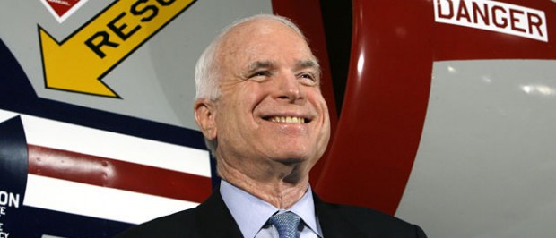 U.S. Republican presidential hopeful John McCain addresses supporters in front of a Navy jet during a rally at the Virginia Aviation Museum in Richmond