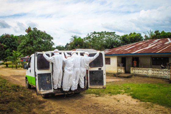 Health workers transport the body of a person suspected to have died of the Ebola virus in Port Loko Community, situated on the outskirts of Freetown, Sierra Leoneon Oct. 21, 2014.