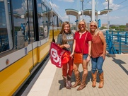 TX-OU fans at DART station at Shops at Park Lane