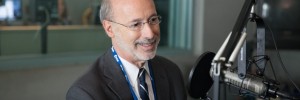 Democrat Tom Wolf talks to reporters at the WHYY studio in Philadelphia.