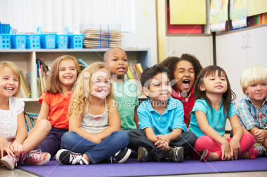 Group of Elementary Pupils In Classroom Royalty Free Stock Photo